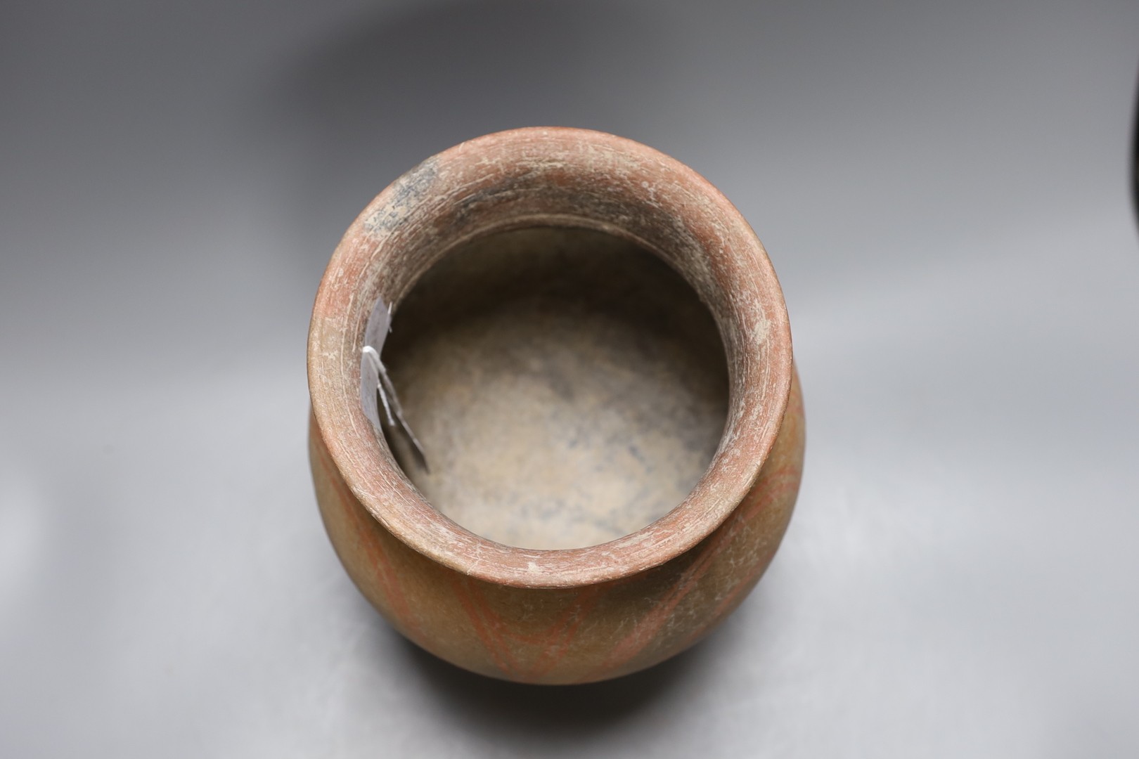 A Thai Ban Chiang terracotta pot, 25cm